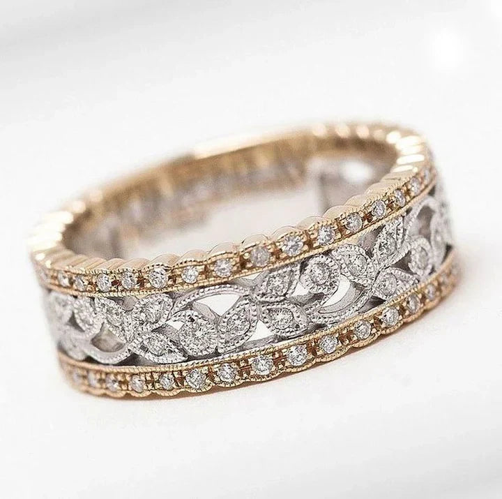 Hollow ring with diamonds in antique gold and silver