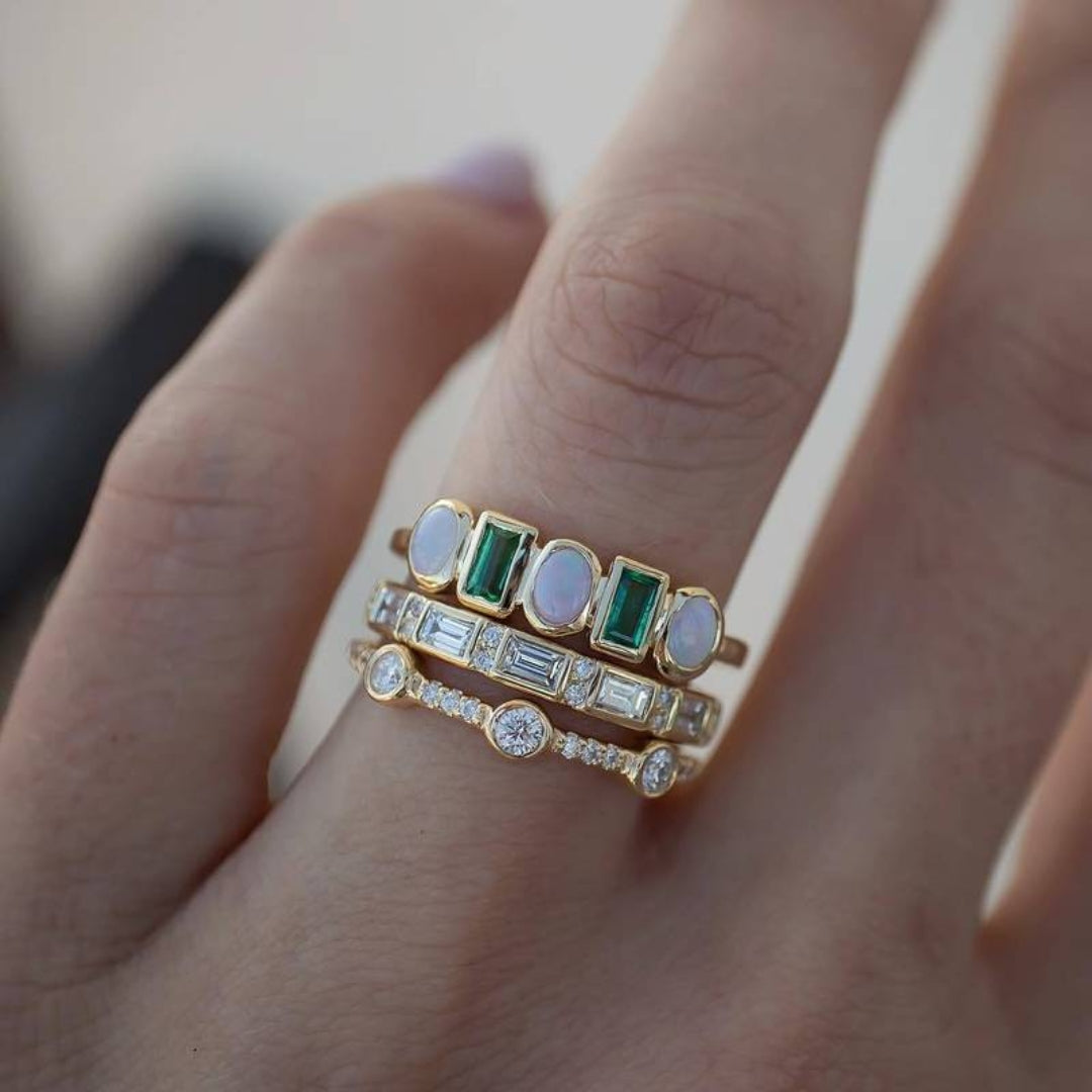 Vintage rings in white and green opal