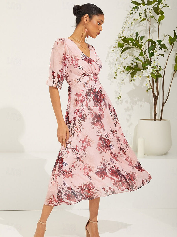 Robe en mousseline de soie rose à fleurs et manches bouffantes