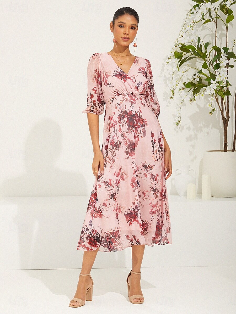 Robe en mousseline de soie rose à fleurs et manches bouffantes