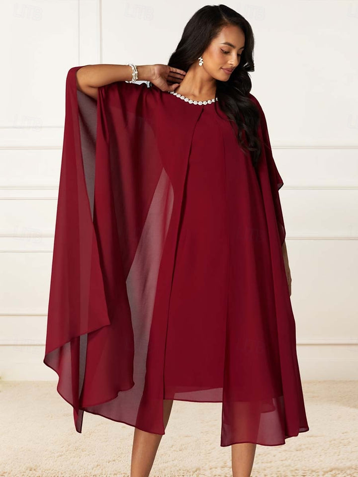 Robe mi-longue drapée à perles rouges